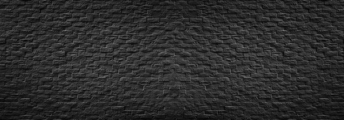 Panorama Black stone brick wall texture.