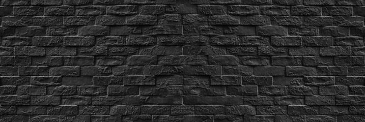 Panorama Surface of Vintage black brick wall background.