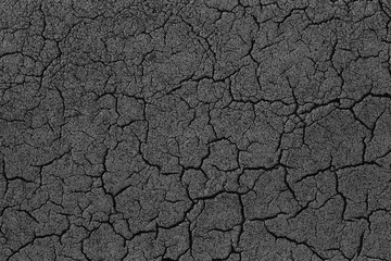 Black asphalt road surface of Texture with cracked.