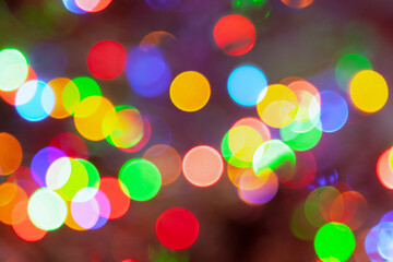 Colorful abstract background, carnival lights in bokeh.Festive blurry background