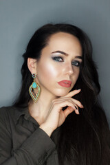 Beautiful young model, longhair girl with bright make-up, red lips