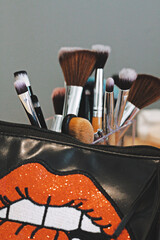 Professional cosmetics set on make up artist work place