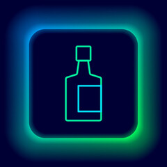 Glowing neon line Tequila bottle icon isolated on black background. Mexican alcohol drink. Colorful outline concept. Vector.
