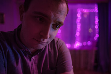 Sad guy in a pink Russian interior dreams of antidereporesants