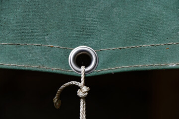 A silver ring in a tarpaulin allows it to be tied down