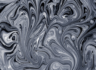 Black-and-white background, texture paint, trend colors. Abstract pattern resulting from mixing the caller with the base paint.