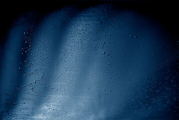 Blue abstract background with tiny bubbles of air.