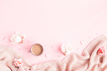 Valentine's Day background. Pink flowers, plaid, cup of coffee on pink background. Valentines day...