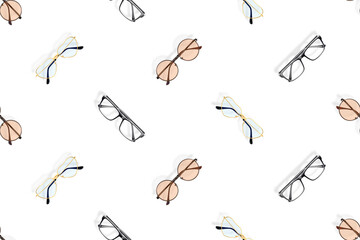 Glasses seamless pattern. Background with a set of glasses of different shapes.