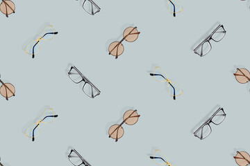 Fototapeta premium Glasses seamless pattern. Background with a set of glasses of different shapes.