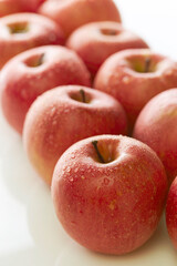 red apples on white background