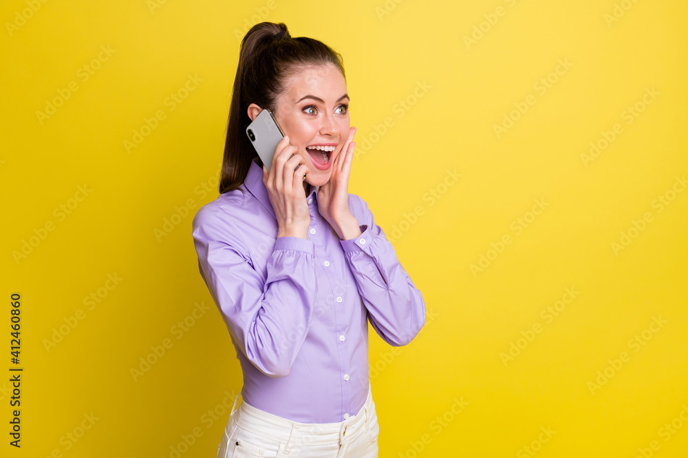 Canvas Prints Photo of shocked lady open mouth talk telephone palm cheek wear purple shirt isolated yellow color background