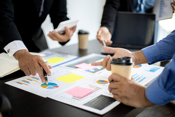 The atmosphere in the startup's meeting room was attended by three delegates to brainstorm and plan the company's operations. Young businessmen form startups and are growing higher. Startup idea.