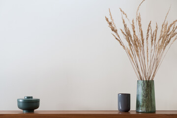 Eclectic decorations on wooden shelf