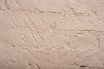 The texture wall is beige. Artistic plaster. Sand color.