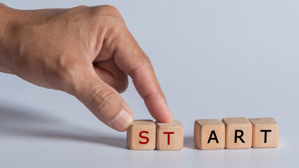 hand holding dice with text for illustration of "Start art" words