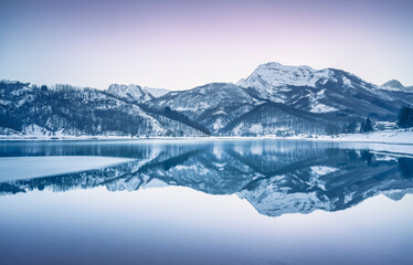 Gramolazzo iced lake and snow in Apuan mountains. Garfagnana, Tuscany, Italy