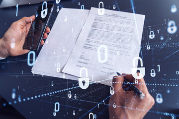 A businessman in formal wear signing the contract to prevent probability of risks in cyber...
