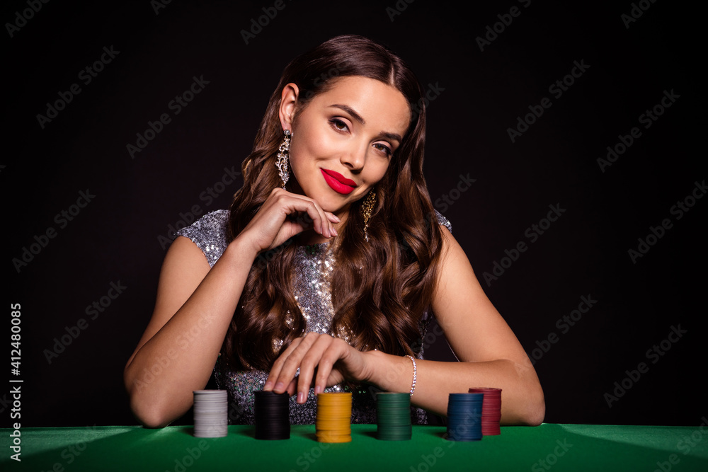 Sticker Photo of charming tender lady sit poker table hand chin finger chips wear glossy dress isolated black color background