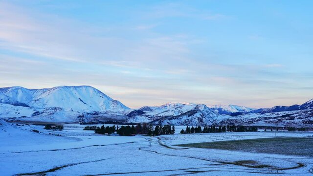 A Beautiful Winter Scene Of Castle Hill In The South Island Of New Zealand, A Group Of Animals Moving Around, Time-lapse Photography