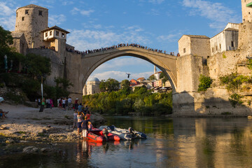 A young man jumps from the historic Old Bridge in Mostar. Bosnia and Herzegovina. 21 september 2018