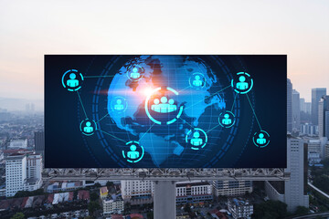 World planet Earth map hologram of social media icons over sunset panoramic cityscape of Kuala Lumpur, Malaysia, Asia. The concept of people connections in KL. Globe