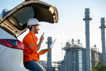 Engineer use radio communication working at refinery industry,Concept to professional engineer on industrial.