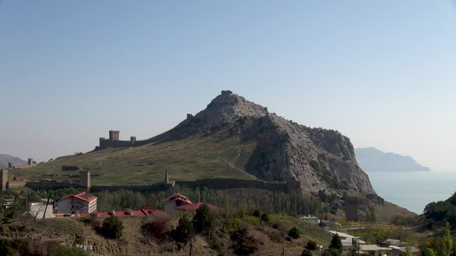 Genoese fortress on Castle Hill (Castle Rock) in city of Sudak. Fortress is powerful fortification, impregnable from west and inaccessible from south. Crimea, Russia. October.2014
