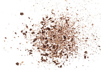 Fototapeta na wymiar Chocolate shavings, grated flakes pile isolated on white background, top view