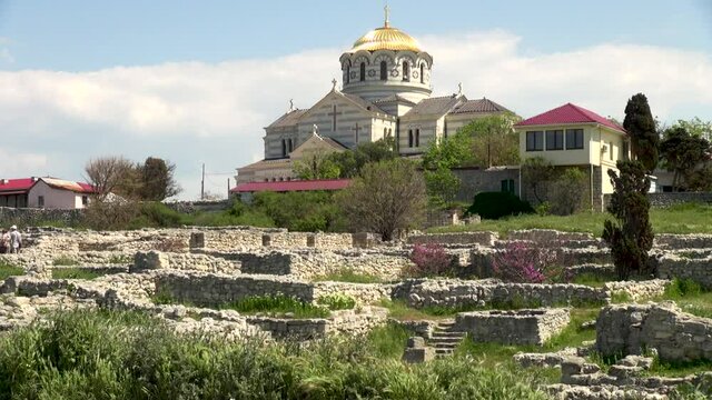 Vladimir Cathedral in Khersones towers on high hill. Cathedral Church of Simferopol and Crimean Diocese of Moscow Patriarchate in Khersones. Close-up. Sevastopol, Crimea, Russia. May 2015:
