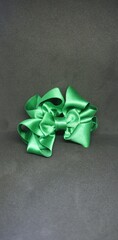 Fancy green ribbon bow photo for commercial use. 