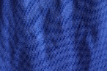 Fototapeta na wymiar Dark blue fabric texture surface background