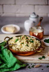 Alfredo pasta sauce with garlic and Parmesan .selective focus