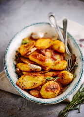 Roasted potatoes.style rustic.selective focus