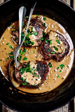 Steak With Peppercorn Sauce..selective Focus.