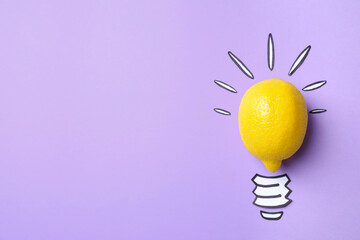 Composition with lemon as lamp bulb and space for text on violet background, top view. Creative concept