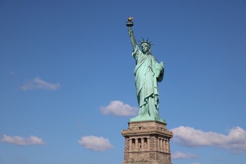 Fototapeta na wymiar Low Angle View Of Statue Of Liberty Against Sky