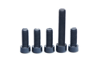 Group of black hex screws with hex cap head close up isolated on white background