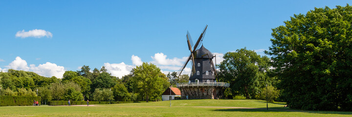 panorama of a windmill in the countryside