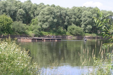 A picturesque place on the river with a boat dock.