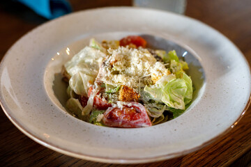 Fresh Caesar salad on a plate