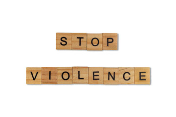 Top view of the word stop violence laid out from square wooden tiles isolated on white background. World and international day.