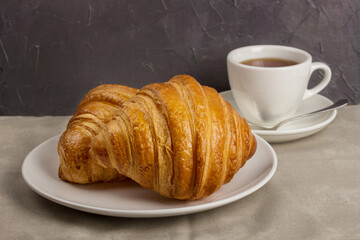 Breakfast with croissant selective focus