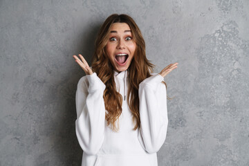 Portrait of a cheerful excited pretty young girl