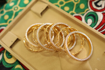 row of diamond studded bangles