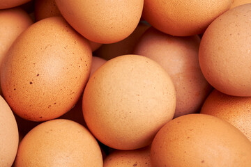 Heap of chicken eggs close-up.