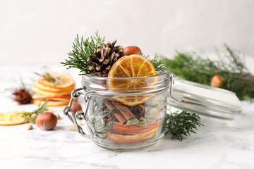 Aroma potpourri with different spices on white marble table