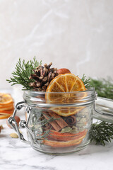 Aroma potpourri with different spices on white marble