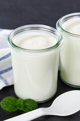 Obraz na płótnie Canvas Natural yogurt breakfast healthy organic eating yoghurt food slate portrait format