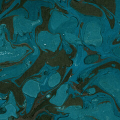 Colorful marble ink texture on watercolor paper background. Marble stone image. Bath bomb effect. Psychedelic biomorphic art.